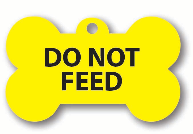 DO NOT FEED YELLOW DOG TAG FOR DOGS WITH DIETARY REQUIREMENTS AND OVERWEIGHT DOGS ON A DIET