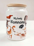 cute and quiry hand printed and oven fired ceramic treat jar for dogs and puppies - made to order in Scotland UK. wooden lid and ceramic cookie jar nom nom nommies 
